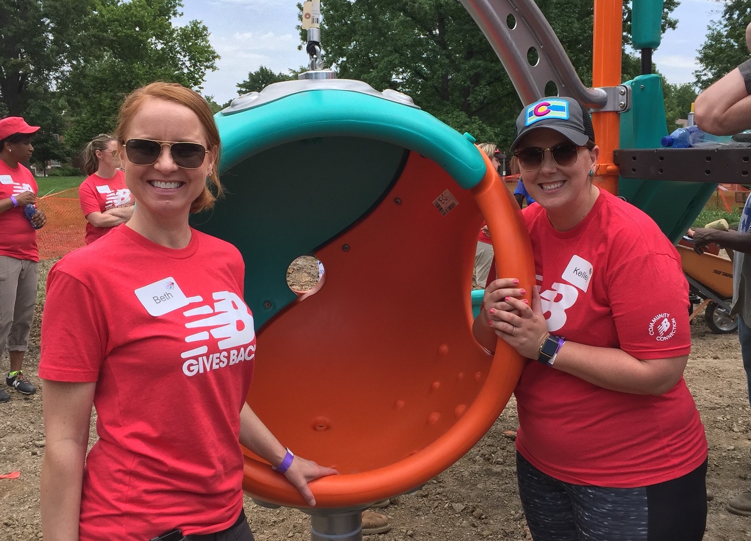 New Balance employees help with the Gravois Park renovation