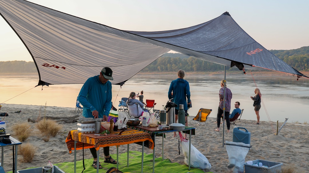 Food prep on the banks of the Mississippi River. 